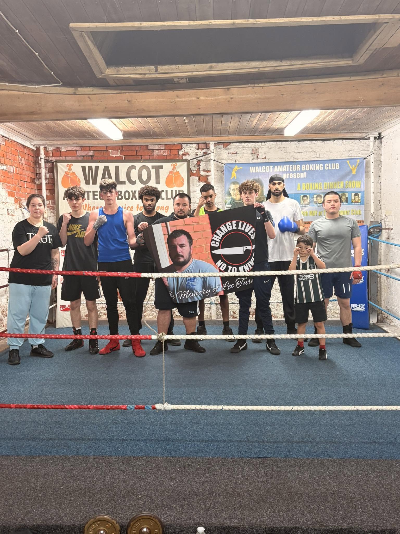 Gym members with a change lives, no to knives photo.